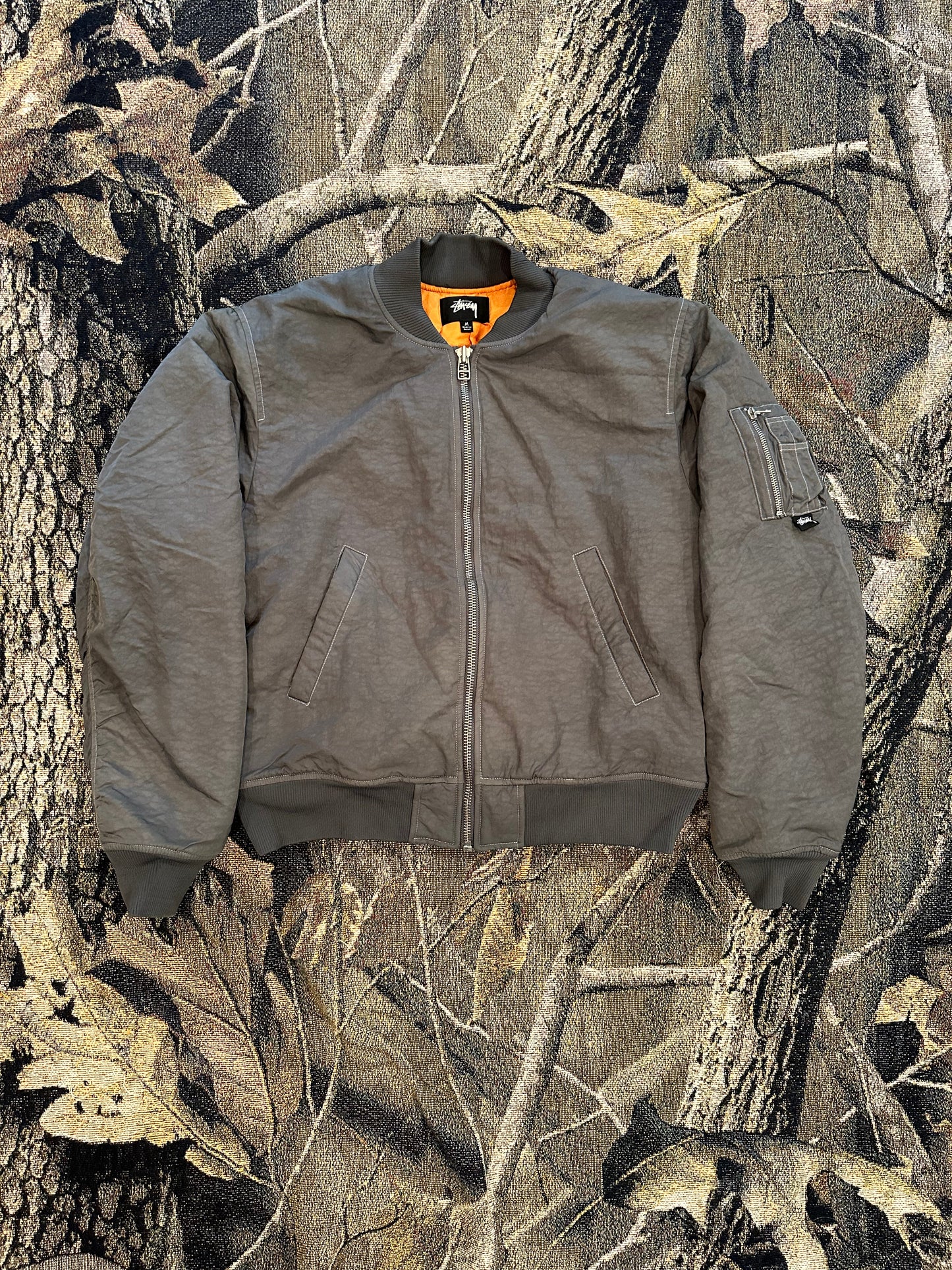 (M) Stussy dyed nylon bomber jacket