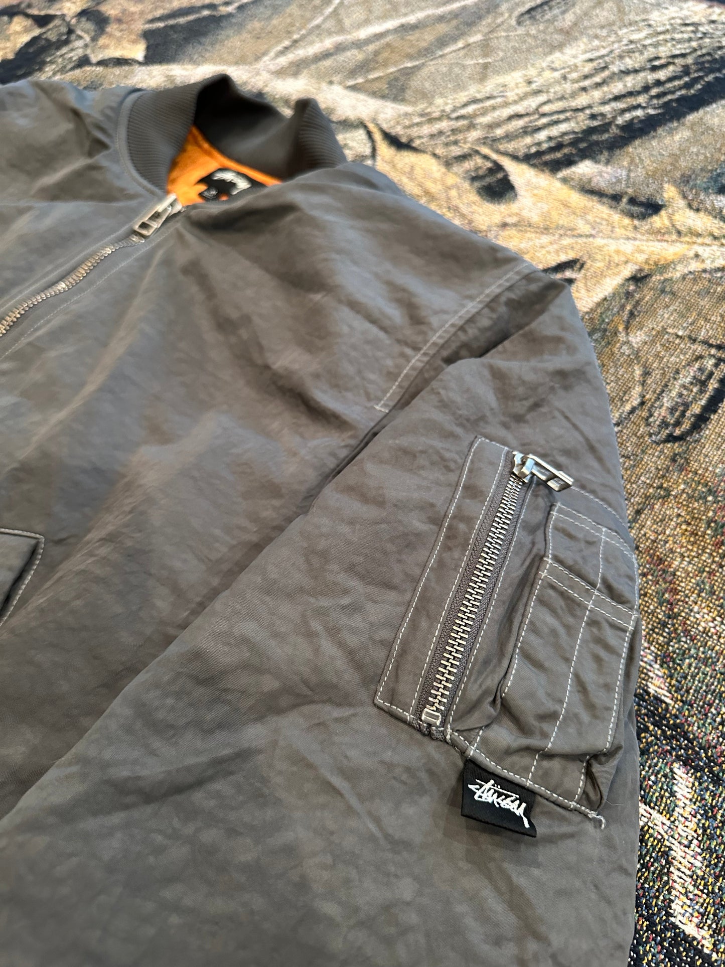 (M) Stussy dyed nylon bomber jacket