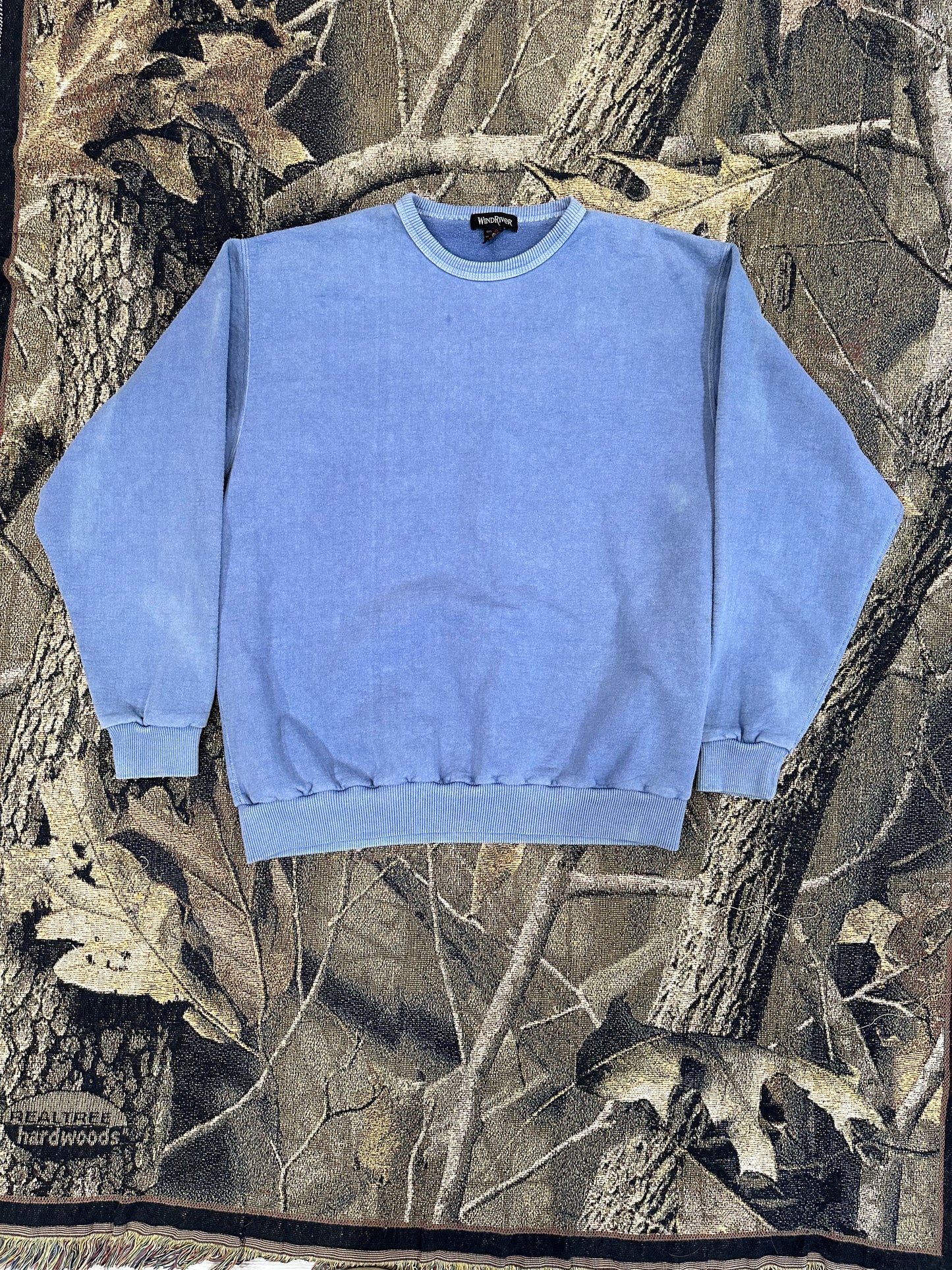 faded pastel blue sweatshirt