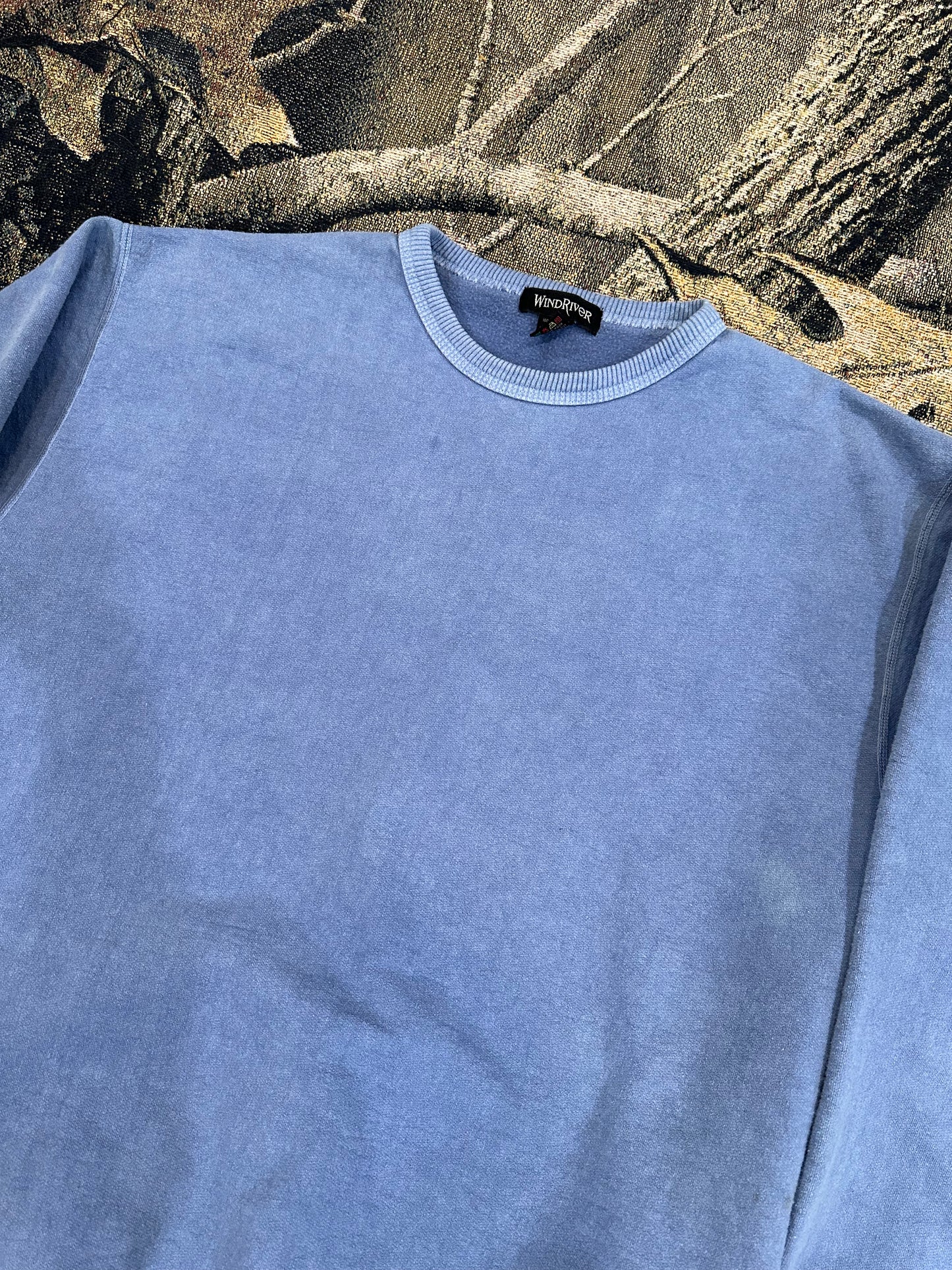 faded pastel blue sweatshirt