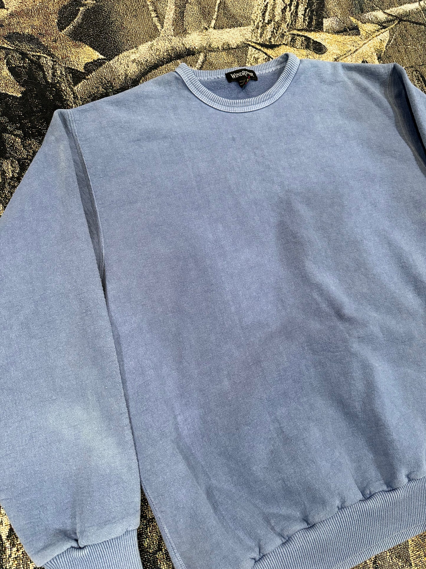faded pastel blue sweatshirt